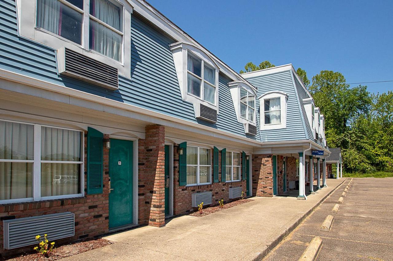 Country Squire Inn And Suites Coshocton Bagian luar foto